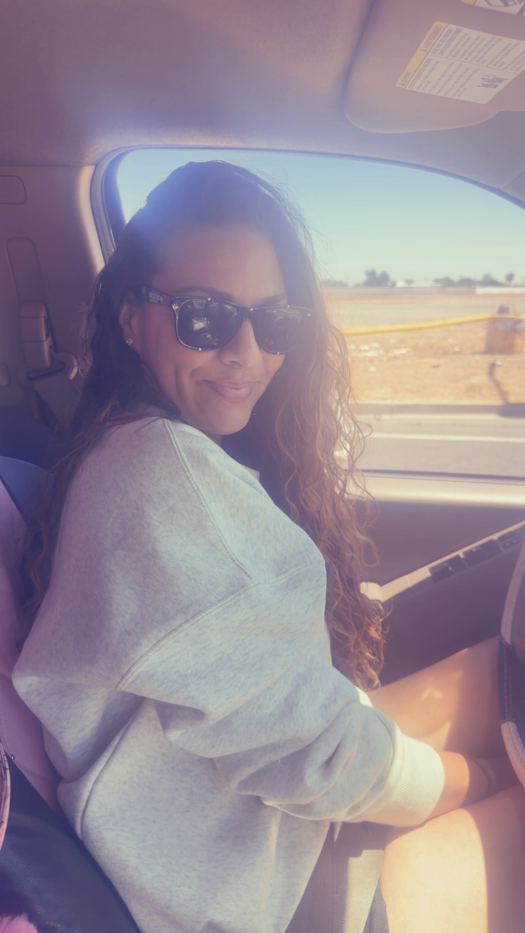 Porsha, founder of Blessed & Blinged, photographed in warm afternoon light